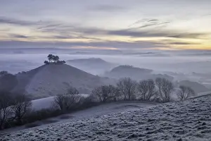 Frosty winter sunrise at Colmers Hill viewed from Quarry Hill, Bridport, Dorset