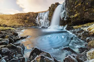 Frozen Kirkjufellsfoss, Grundafjordur, Snaefellsnes peninsula, Vesturland region, Iceland