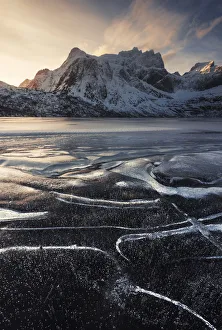 Rugged Peak Prints: Frozen lake near Nusfjord in the Lofoten islands, Norway