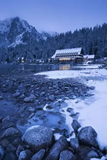 Images Dated 6th January 2015: Frozen lake shore and Mountain House at twilight, Popradske Pleso, High Tatras, Slovakia