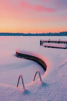 Ruka Prints: A frozen lake at sunset in a remote area near Ruka in finnish Lapland in winter landscape