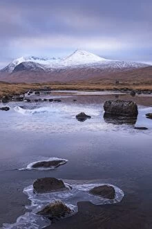 Images Dated 25th November 2013: Frozen lochan reflecting the Black Mount, Rannoch Moor, Scotland. Winter (November)