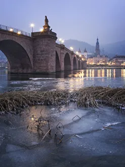 Frozen Neckar river and Old Bridge, Heidelberg, Baden-Wurttemberg, Germany