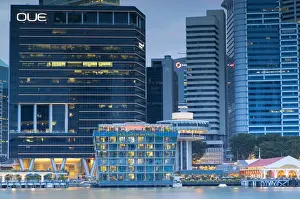 Marina Bay Prints: Fullerton Bay Hotel and skyscrapers of Central Business District at dusk