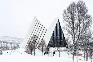 Nordland County Prints: The futuristic building of Arctic Cathedral in the snowy landscape, Tromso, Norway