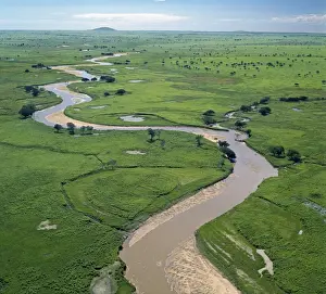 V Iew Prints: The Garamba River winds it way through the grasslands of the Garamba National Park in Northern Congo