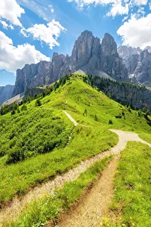 Pass Prints: Gardena Pass at sunset after a storm. Dolomites, South Tyrol, Bolzano district, Italy
