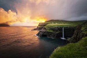 Natural Wonder Collection: Gasadalur waterfall at sunset, Vagar, Faroe Islands