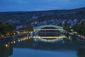 Steel Prints: Georgia, Tbilisi, Peace bridge with Old Town and Narikala Fortress in background