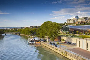 Georgia, Tbilisi, View of Mtkvari (Kura) river, Rike Park Theater and Exhibition Hall