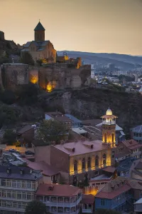 Georgian Orthodox Prints: Georgia, Tbilisi, View of Narikala Fortress and St Nicholas church above Tbilisi Mosque