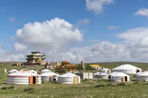 Tents Prints: Ger camp and Tsorjiin Khureenii temple in the background. Middle Gobi province, Mongolia
