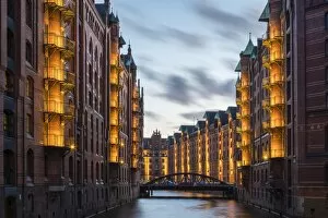 Images Dated 15th April 2017: Germany, Hamburg, HafenCity. Historic warehouses on the Wandrahmsfleet canal in the