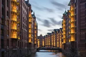 Germany, Hamburg, HafenCity. Historic warehouses on the Wandrahmsfleet canal in