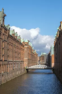 Germany, Hamburg. Historic warehouse buildings along the Brooksfleet canal, in the