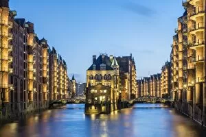 Images Dated 15th April 2017: Germany, Hamburg, Speicherstadt. Historic Wasserschloss at dusk, view from the