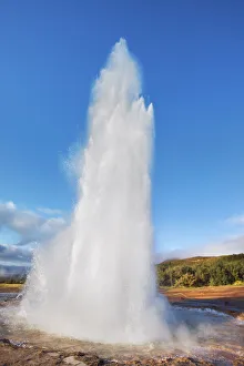 Geyser Strokkur erupting - Iceland, Southern Region, Haukadalur, Strokkur