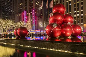 Giant red Christmas ornaments on display on Avenue of Americas (6th Avenue) during