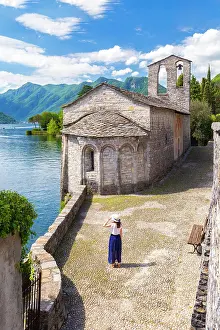 Girls Prints: A girl admiring Chiesa di San Giacomo and Isola Comacina