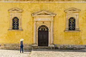 Images Dated 15th June 2022: A girl in a hat by the Church of Agia Marina, Agia Marina, Zakynthos, Zante, Ionian Islands, Greece