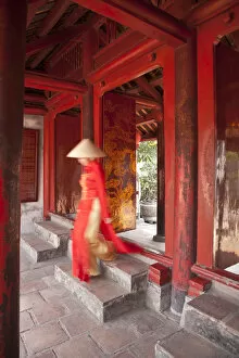Images Dated 10th October 2012: Girl wearing Ao Dai dress, Temple of Literature, Hanoi, Vietnam (MR)