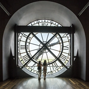 Inside Prints: Two girls looking through a giant clock in Musee d Orsay, Paris, France