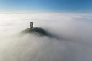 Images Dated 12th June 2023: Glastonbury Tor surrounded by a sea of mist, Glastonbury, Somerset, England. Winter (December) 2022