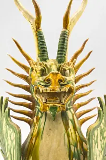 Dragon Prints: Glazed pottery statue of Tomb Guardian beast(Tang dynasty AD618-907), Shanghai Museum