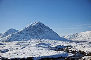 Images Dated 10th June 2011: Glen Coe, Scotland. Snow covers the picturesque Glen Coe, with Buachaille Etive Mor