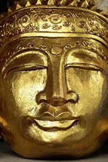 Head Prints: Golden Buddha statue, Bali, Indonesia