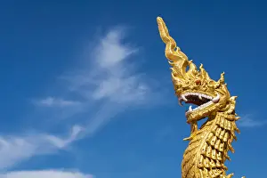 Golden dragon statue at Dhart Zom Doi Kabar Aye Pagoda near Kengtung, Mong La