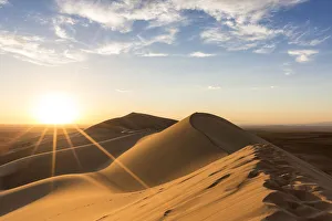 Golden light on Khongor sand dunes in Gobi Gurvan Saikhan National Park. Sevrei district Golden light on Khongor sand dunes in Gobi Gurvan Saikhan National Park. Sevrei district
