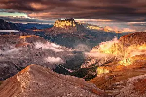 South Tyrol Prints: Golden lights of autumn and clouds over Puez Odle Natural Park