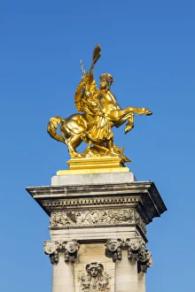 Golden statue on the Pont Alexandre III, Paris, France