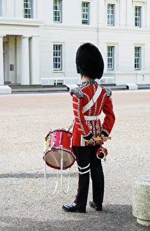 Sentry Prints: A Goldstream band musician, at Changing the Guard ceremony (Guard Mounting) outside Wellington Barracks
