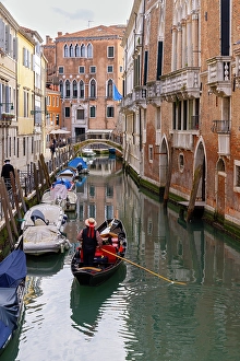 Mediterrranean Prints: A gondola on a canal in Venice, Italy