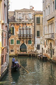 Gondola on canal in Venice, Veneto, Italy