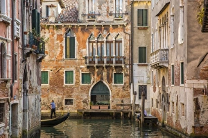Gondola on canal in Venice, Veneto, Italy