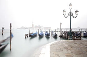 Images Dated 18th November 2016: Gondolas moored at the Bacino di San Marco with a slightly visible Church of San Giorgio Maggiore