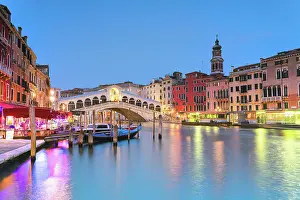City Life Prints: Gondolas moored in Grand Canal near Rialto Bridge at dusk, Venice, Veneto, Italy
