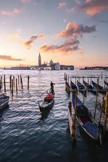 Canal Prints: Gondolas near St Mark Square with San Giorgio Island on the background during sunrise