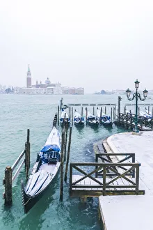 Gondola Prints: Gondolas with snow at St Marks waterfront, Venice, Veneto, Italy
