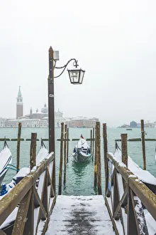 St Mark Square Prints: Gondolas with snow at St Marks waterfront, Venice, Veneto, Italy