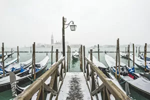 Images Dated 1st March 2018: Gondolas with snow at St Marks waterfront, Venice, Veneto, Italy