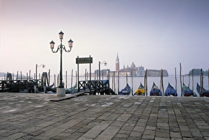 <b class=qtipBold><figcaption>Gondolas, St</figcaption></b><br>Gondolas, St. Mark's Square, Venice, Italy<br><em>© Jon Arnold</em> Gondolas, St