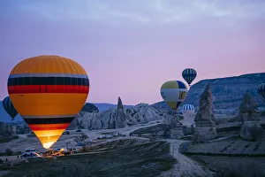 Kapadokya Prints: Goreme, listed as World Heritage by UNESCO, overflight of Cappadocia with multicolored