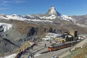 Gornergrat mountain station (3100m) with Gornergratbahn cog railway, view of Matterhorn Peak (4478m), Swiss Alps