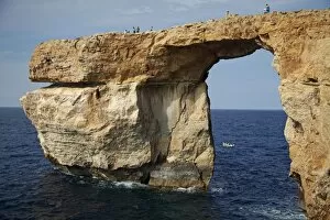 Gozo, Malta, Europe; A natural arch formed in rock called the Azure Window found in Dwejra