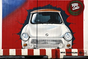 Graffiti Prints: Graffiti in former East Berlin showing the Trabant, the most common East German Car