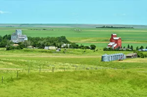 Prairie Sentinel Collection: Grain elevators and the town of Ponteix Ponteix Saskatchewan, Canada